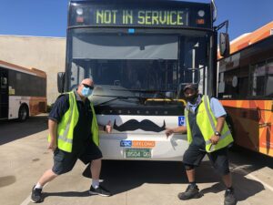 CDC Staff Standing In Front Of A CDC Geelong Bus With Movember Moustaches